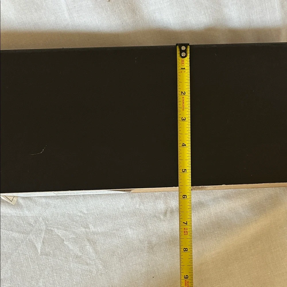 Sleek Black Wall Shelf